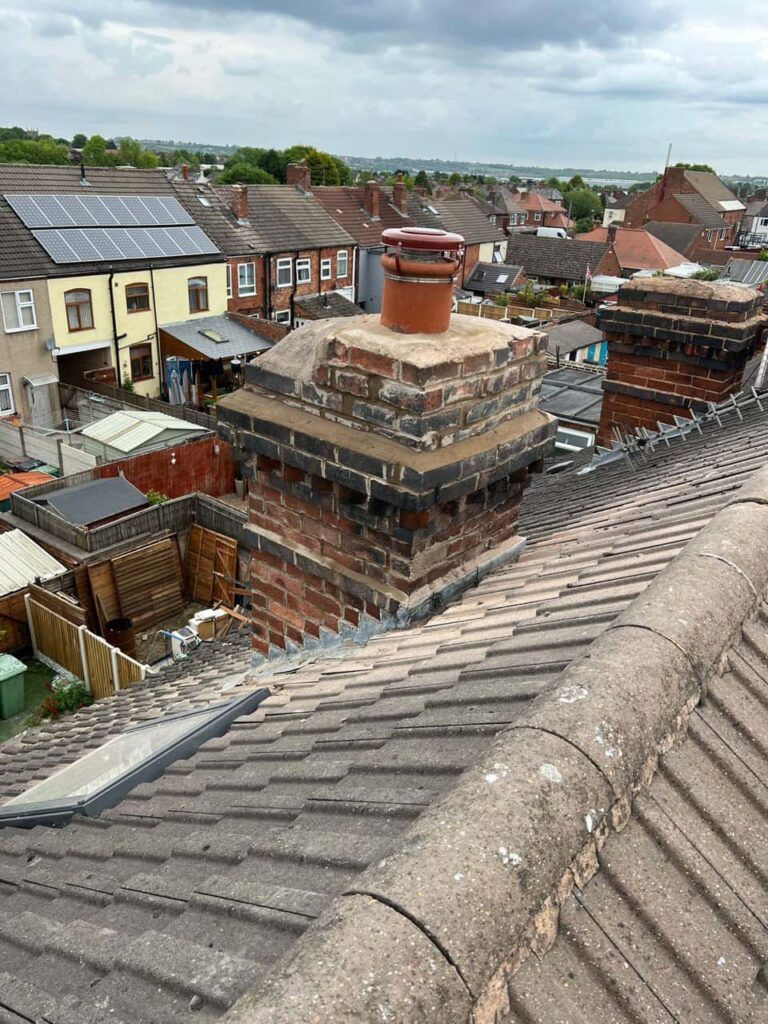 This is a photo taken from a roof which is being repaired by South Normanton Roofing Repairs, it shows a street of houses, and their roofs